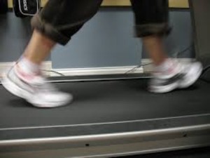 feet on a treadmill